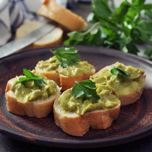 Avocado and Calamansi Crème topped Crostini