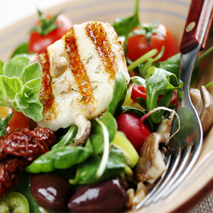 Grilled Goat Cheese with Salad and Pine Nut Seeds